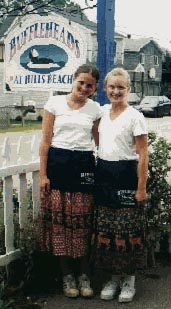 Waitresses in front of Buffleheads sign